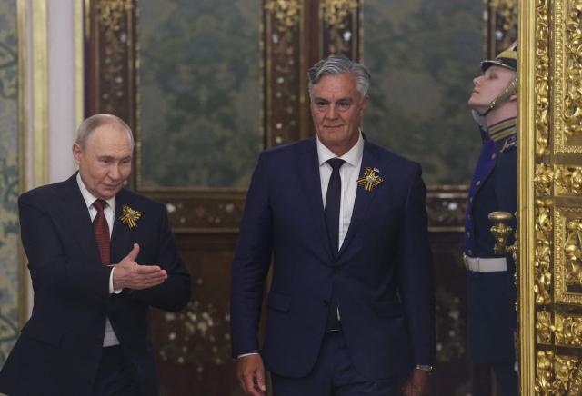 Russian President Vladimir Putin and President of Republika Srpska Sinisa Karan attend a meeting at the Kremlin in Moscow on May 9, 2026. (Photo by MAXIM SHIPENKOV / POOL / AFP)