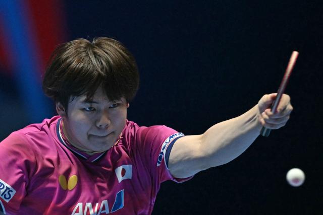 Japan's Sora Matsushima returns to Taiwan's Feng Yi-Hsin during their Men's Teams semi-final match at the ITTF World Table Tennis Championships in Wembley Arena, west London on May 9, 2026. (Photo by Glyn KIRK / AFP)