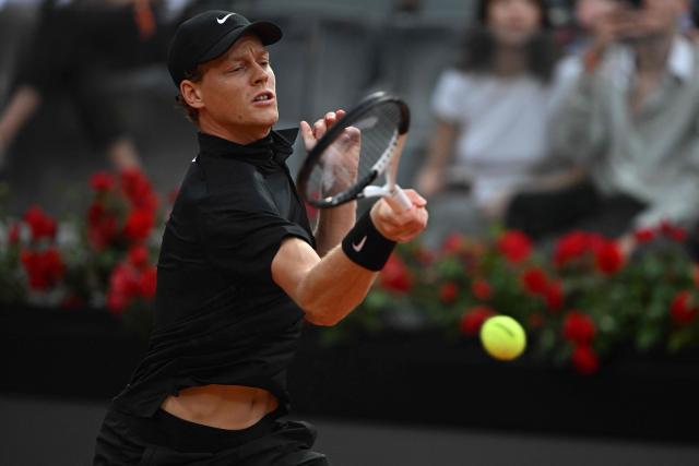 Italy's Jannik Sinner hits a return to Austria's Sebastian Ofner during the ATP Rome Open tennis tournament at Foro Italico in Rome on May 8, 2026. (Photo by Tiziana FABI / AFP)
