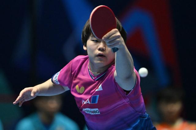 Japan's Sora Matsushima returns to Taiwan's Feng Yi-Hsin during their Men's Teams semi-final match at the ITTF World Table Tennis Championships in Wembley Arena, west London on May 9, 2026. (Photo by Glyn KIRK / AFP)