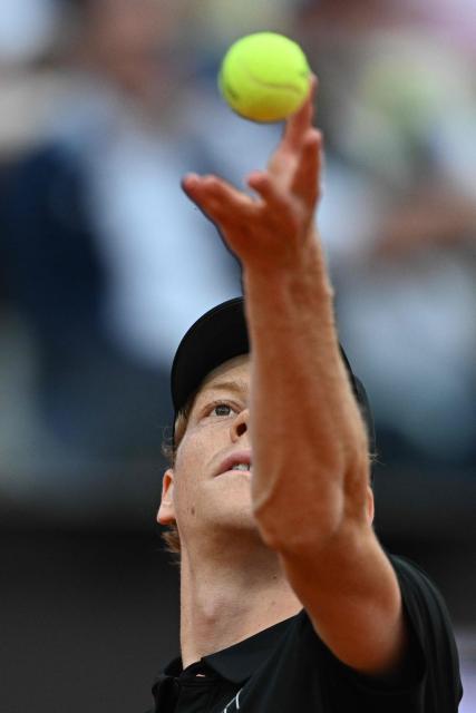 Italy's Jannik Sinner serves to Austria's Sebastian Ofner during the ATP Rome Open tennis tournament at Foro Italico in Rome on May 8, 2026. (Photo by Tiziana FABI / AFP)