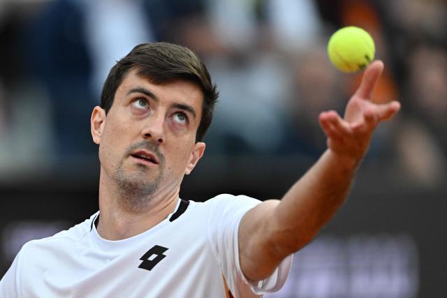 Austria's Sebastian Ofner serves to Italy's Jannik Sinner during the ATP Rome Open tennis tournament at Foro Italico in Rome on May 8, 2026. (Photo by Tiziana FABI / AFP)