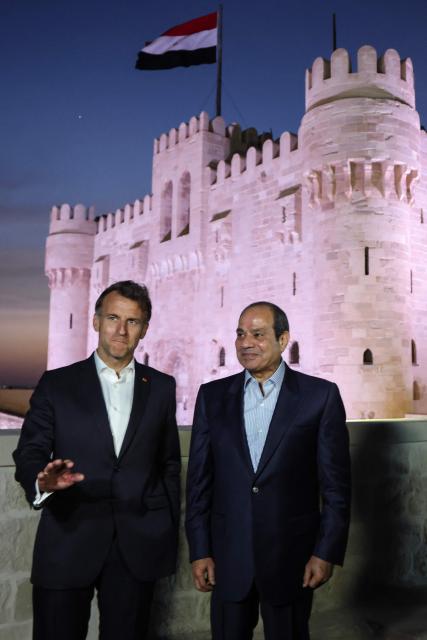 France's President Emmanuel Macron (L) and his Egyptian counterpart Abdel Fattah al-Sisi  visit the Citadel of Qaitbay in Alexandria on May 9, 2026. Macron on May 9 embarked on a visit to Africa aimed at renewing France's engagement with the continent after years of strained ties with former French speaking colonies, also travelling to Egypt, Ethiopia and Kenya. (Photo by Ludovic MARIN / AFP)