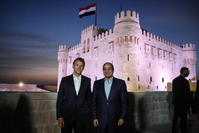 France's President Emmanuel Macron (L) and his Egyptian counterpart Abdel Fattah al-Sisi  visit the Citadel of Qaitbay in Alexandria on May 9, 2026. Macron on May 9 embarked on a visit to Africa aimed at renewing France's engagement with the continent after years of strained ties with former French speaking colonies, also travelling to Egypt, Ethiopia and Kenya. (Photo by Ludovic MARIN / AFP)