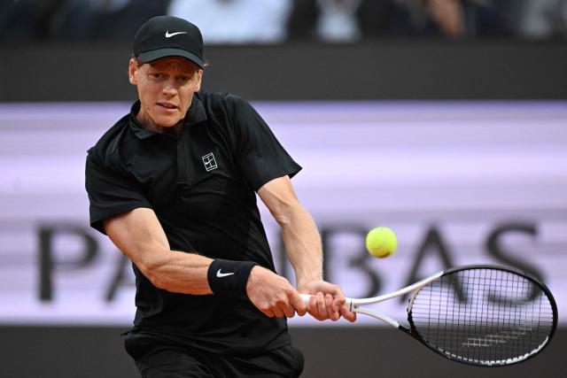 Italy's Jannik Sinner hits a return to Austria's Sebastian Ofner during the ATP Rome Open tennis tournament at Foro Italico in Rome on May 8, 2026. (Photo by Tiziana FABI / AFP)
