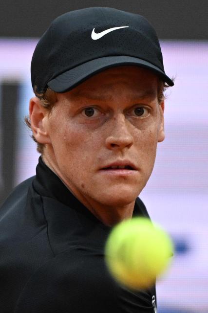 Italy's Jannik Sinner prepares to hit a return to Austria's Sebastian Ofner during the ATP Rome Open tennis tournament at Foro Italico in Rome on May 8, 2026. (Photo by Tiziana FABI / AFP)