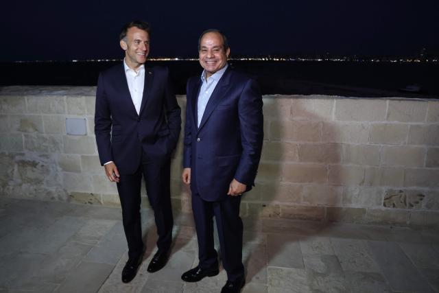 France's President Emmanuel Macron (L) and his Egyptian counterpart Abdel Fattah al-Sisi  visit the Citadel of Qaitbay in Alexandria on May 9, 2026. Macron on May 9 embarked on a visit to Africa aimed at renewing France's engagement with the continent after years of strained ties with former French speaking colonies, also travelling to Egypt, Ethiopia and Kenya. (Photo by Ludovic MARIN / AFP)