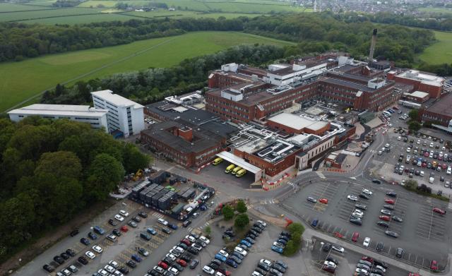 An overhead view shows Arrowe Park Hospital, where British nationals set to be repatriated after contracting hantavirus aboard an Atlantic expedition cruise ship are set to be quarantined, in Wirral, north west England on May 9, 2026. Repatriation flights for passengers aboard the cruise ship MV Hondius, hit by a deadly hantavirus outbreak are already planned to the United States, Britain, France and other countries, Spain's interior minister announced on on May 9,2026. The British passengers will have to isolate for 45 days once they return to the UK, and will be closely monitored and tested by the agency. (Photo by Annabel Lee-Ellis / AFP)