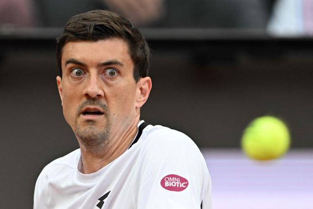 Austria's Sebastian Ofner prepares a return to Italy's Jannik Sinner during the ATP Rome Open tennis tournament at Foro Italico in Rome on May 8, 2026. (Photo by Tiziana FABI / AFP)