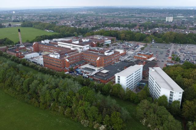 An overhead view shows Arrowe Park Hospital, where British nationals set to be repatriated after contracting hantavirus aboard an Atlantic expedition cruise ship are set to be quarantined, in Wirral, north west England on May 9, 2026. Repatriation flights for passengers aboard the cruise ship MV Hondius, hit by a deadly hantavirus outbreak are already planned to the United States, Britain, France and other countries, Spain's interior minister announced on on May 9,2026. The British passengers will have to isolate for 45 days once they return to the UK, and will be closely monitored and tested by the agency. (Photo by Annabel Lee-Ellis / AFP)