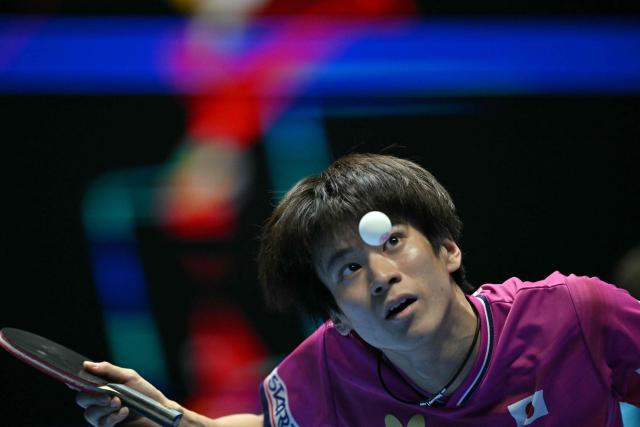 Japan's Shunsuke Togami serves to Taiwan's Kuo Guan-Hong during their Men's Teams semi-final match at the ITTF World Table Tennis Championships in Wembley Arena, west London on May 9, 2026. (Photo by Glyn KIRK / AFP)