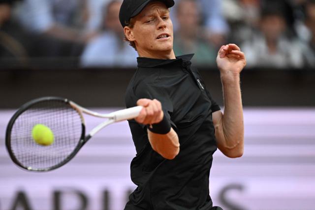 Italy's Jannik Sinner hits a return to Austria's Sebastian Ofner during the ATP Rome Open tennis tournament at Foro Italico in Rome on May 8, 2026. (Photo by Tiziana FABI / AFP)