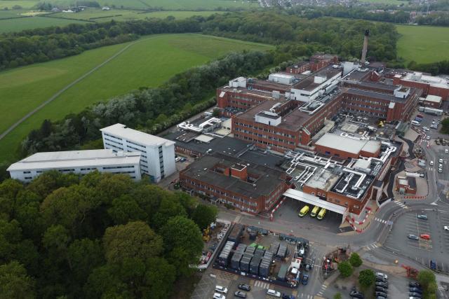 An overhead view shows Arrowe Park Hospital, where British nationals set to be repatriated after contracting hantavirus aboard an Atlantic expedition cruise ship are set to be quarantined, in Wirral, north west England on May 9, 2026. Repatriation flights for passengers aboard the cruise ship MV Hondius, hit by a deadly hantavirus outbreak are already planned to the United States, Britain, France and other countries, Spain's interior minister announced on on May 9,2026. The British passengers will have to isolate for 45 days once they return to the UK, and will be closely monitored and tested by the agency. (Photo by Annabel Lee-Ellis / AFP)