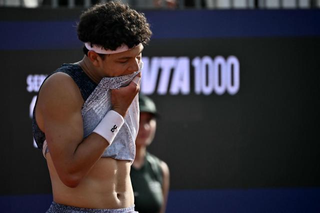 USA's Ben Shelton reacts during his match against Georgia's Nikoloz Basilashvili during the ATP Rome Open tennis tournament at Foro Italico in Rome on May 9, 2026. (Photo by Filippo MONTEFORTE / AFP)