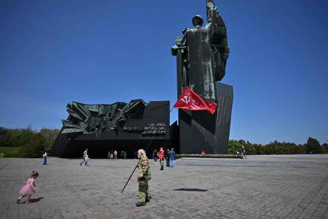 People visit the Leninist Komsomol Park during celebrations of the Victory Day in Donetsk, Russian-controlled Ukraine, on May 9, 2026, amid the ongoing Russian-Ukrainian conflict. (Photo by AFP)