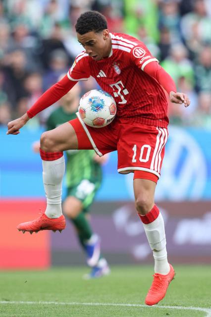 Bayern Munich's German midfielder #10 Jamal Musiala controls the ball during the German first division Bundesliga football match between VfL Wolfsburg and FC Bayern Munich in Wolfsburg, on May 9, 2026. (Photo by Ronny HARTMANN / AFP) / DFL REGULATIONS PROHIBIT ANY USE OF PHOTOGRAPHS AS IMAGE SEQUENCES AND/OR QUASI-VIDEO