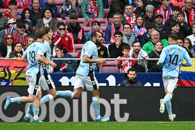 Celta Vigo's Spanish forward #07 Borja Iglesias (C) celebrates scoring his team's first goal during the Spanish league football match between Club Atletico de Madrid and RC Celta de Vigo at the Metropolitano Stadium in Madrid on May 9, 2026. (Photo by Javier SORIANO / AFP)