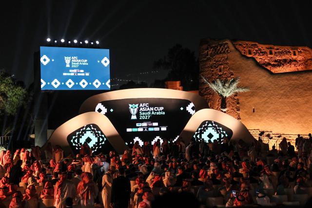 Guests attend the opening ceremony of the final draw of the 2027 AFC Asian Cup in Diriyah, on the outskirts of Riyadh, on May 9, 2026. The 19th edition of the Asian Cup is scheduled to take place from January 7 to February 5 next year in Saudi Arabia. (Photo by Fayez NURELDINE / AFP)