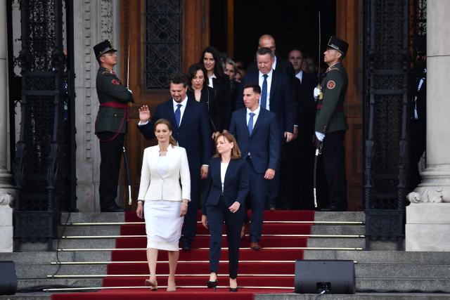 Speaker of the Hungarian parliament Agnes Forsthoffer (L) leaves the parliament after the Prime Minister swearing-in ceremony swearing-in ceremony in Budapest on May 9, 2026. Lawmakers in Hungary on May 9, 2026 swore in pro-European conservative Peter Magyar as the country's new prime minister, after elections last month that ended Viktor Orban's 16 years in power. The parliament formally elected Magyar with 140 votes for, 54 against, and one abstention in the inaugural session of the new chamber resulting from the April polls. (Photo by Ferenc ISZA / AFP)