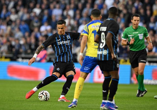 Club Brugge's Serbian midfielder #25 Aleksandar Stankovic kicks the ball during the Belgian "Pro League" Champions' play-off (day 7 out of 10) football match between Club Brugge KV and Sint-Truidense Voetbalvereniging (STVV) at the Jan Breydel Stadium in Bruges on May 9, 2026. (Photo by JOHN THYS / BELGA / AFP)
