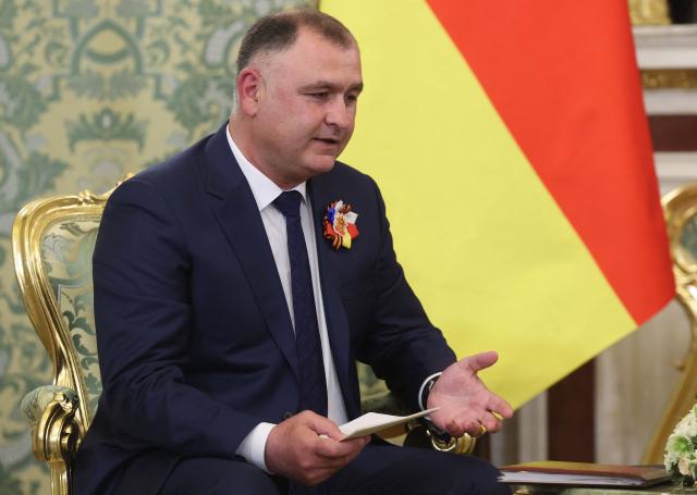 The leader of the breakaway Georgian region of South Ossetia Alan Gagloev attends a meeting with Russian President at the Kremlin in Moscow on May 9, 2026. (Photo by MAXIM SHIPENKOV / POOL / AFP)