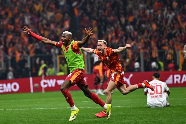 Galatasaray's Nigerian forward #45 Victor Osimhen and Galatasaray's Turkish forward #53 Baris Alper Yilmaz celebrates after winning the Turkish Super lig football match between Galatasaray and Antalyaspor, and the championship, at the Rams Park stadium in Istanbul, on May 9, 2026. Galatasaray clinched the Turkish Super Lig championship with one week remaining in the season. (Photo by Yasin AKGUL / AFP)
