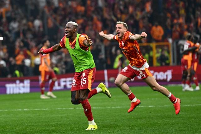 Galatasaray's Nigerian forward #45 Victor Osimhen and Galatasaray's Turkish forward #53 Baris Alper Yilmaz celebrates after winning the Turkish Super lig football match between Galatasaray and Antalyaspor, and the championship, at the Rams Park stadium in Istanbul, on May 9, 2026. Galatasaray clinched the Turkish Super Lig championship with one week remaining in the season. (Photo by Yasin AKGUL / AFP)