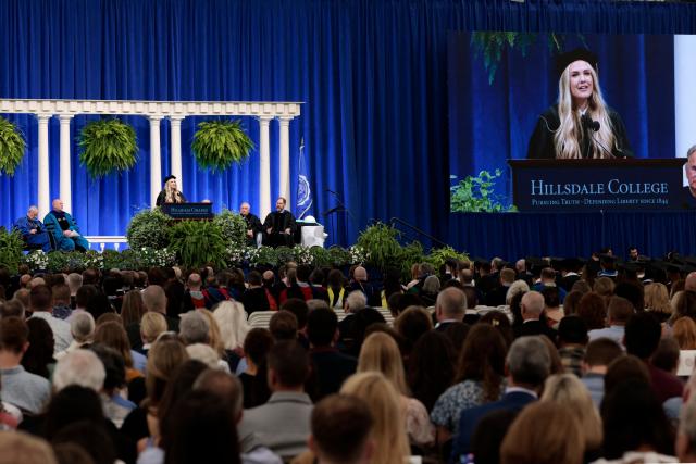 Erika Kirk, Turning Point CEO and widow of its founder Charlie Kirk, delivers a commencement address at Hillsdale College during the college's 174th commencement ceremony in Hillsdale, Michigan, on May 9, 2026. (Photo by JEFF KOWALSKY / AFP)