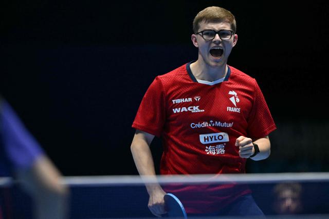 France's Alexis Lebrun reacts to winning a game against China's Liang Jingkun during their Men's Teams semi-final match at the ITTF World Table Tennis Championships in Wembley Arena, west London on May 9, 2026. (Photo by Glyn KIRK / AFP)