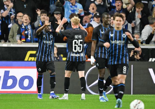 Club's Portuguese forward Carlos Forbs (L) celebrates after scoring a goal during the Belgian "Pro League" Champions' play-off (day 7 out of 10) football match between Club Brugge KV and Sint-Truidense Voetbalvereniging (STVV) at the Jan Breydel Stadium in Bruges on May 9, 2026. (Photo by JOHN THYS / BELGA / AFP)
