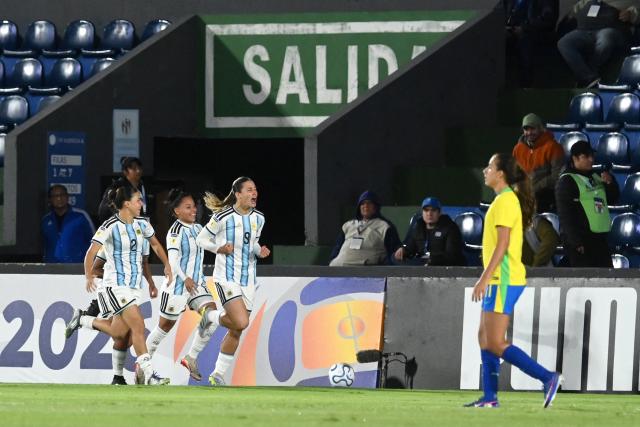 Argentina's forward #09 Mercedes Diz celebrates scoring her team's first goal during the Conmebol Women U-17 final football match between Brazil and Argentina at the Defensores del Chaco stadium in Asuncion on May 9, 2026. (Photo by DANIEL DUARTE / AFP)