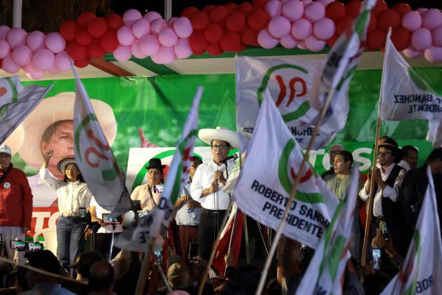 Peru's presidential candidate Roberto Sanchez, for the Juntos por el Peru party, speaks to supporters during a rally in Huaycan community in Lima, Peru on May 9, 2026. (Photo by Connie FRANCE / AFP)
