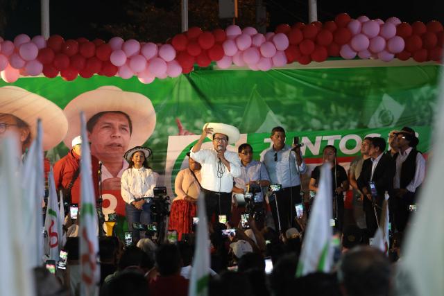 Peru's presidential candidate Roberto Sanchez, for the Juntos por el Peru party, speaks to supporters during a rally in Huaycan community in Lima, Peru on May 9, 2026. (Photo by Connie FRANCE / AFP)