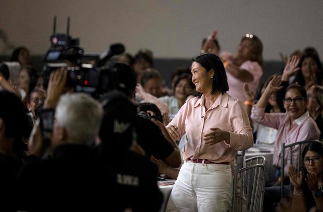 Peru’s presidential candidate for the Fuerza Popular party, Keiko Fujimori, smiles to supporters during a campaign rally as part of Mother's Day celebrations in Lima on May 9, 2026. (Photo by Ernesto BENAVIDES / AFP)