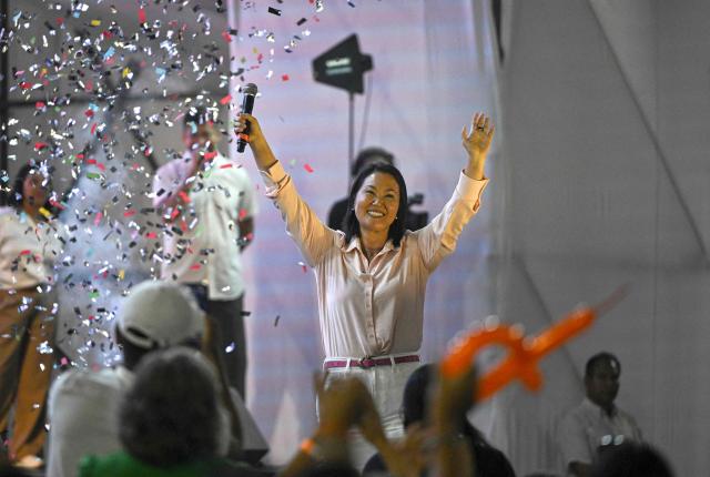Peru’s presidential candidate for the Fuerza Popular party, Keiko Fujimori, smiles to supporters during a campaign rally as part of Mother's Day celebrations in Lima on May 9, 2026. (Photo by Ernesto BENAVIDES / AFP)