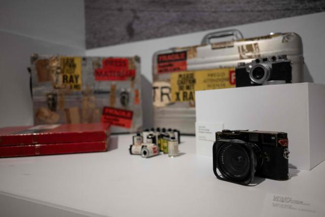 This picture shows Leica film cameras and roll films used by Turkish photojournalist Ara Guler during the Cannes Film Festival at the Ara Guler Museum in Istanbul, on May 7, 2026. Frozen in time yet alive with all the glamour and spontaneity: all those moments are part of a newly opened exhibition featuring previously unseen photographs taken by Turkey's legendary photographer Ara Guler at the Cannes Film Festival between 1957 and 67. (Photo by Ozan KOSE / AFP)