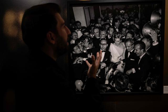 A man looks at a photo taken by Ara Guler during Cannes Film Festival at Ara Guler museum in Istanbul, on May 7,2026. Frozen in time yet alive with all the glamour and spontaneity: all those moments are part of a newly opened exhibition featuring previously unseen photographs taken by Turkey's legendary photographer Ara Guler at the Cannes Film Festival between 1957 and 67. (Photo by Ozan KOSE / AFP)
