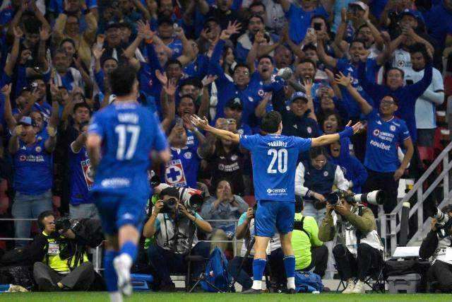 Cruz Azul's Argentine forward #20 Jose Paradela celebrates scoring his team's first goal during the Liga MX Clausura quarter-finals second leg football match between Cruz Azul and Atlas at Banorte Stadium in Mexico City on May 9, 2026. (Photo by Alfredo ESTRELLA / AFP)