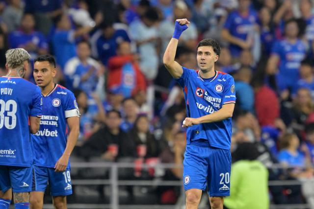 Cruz Azul's Argentine forward #20 Jose Paradela celebrates scoring his team's first goal during the Liga MX Clausura quarter-finals second leg football match between Cruz Azul and Atlas at Banorte Stadium in Mexico City on May 9, 2026. (Photo by Alfredo ESTRELLA / AFP)