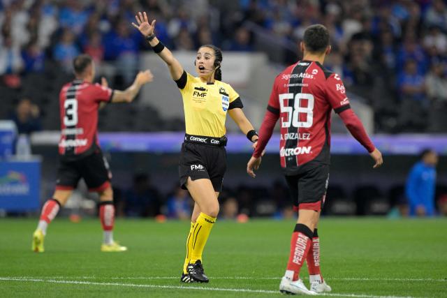 Mexican referee Katia Itzel Garcia gestures during the Liga MX Clausura quarter-finals second leg football match between Cruz Azul and Atlas at Banorte Stadium in Mexico City on May 9, 2026. (Photo by Alfredo ESTRELLA / AFP)
