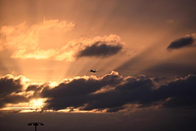 A photo taken on May 7, 2026 shows a Qantas Boeing 737 departing Melbourne's Tullamarine Airport. (Photo by William WEST / AFP)