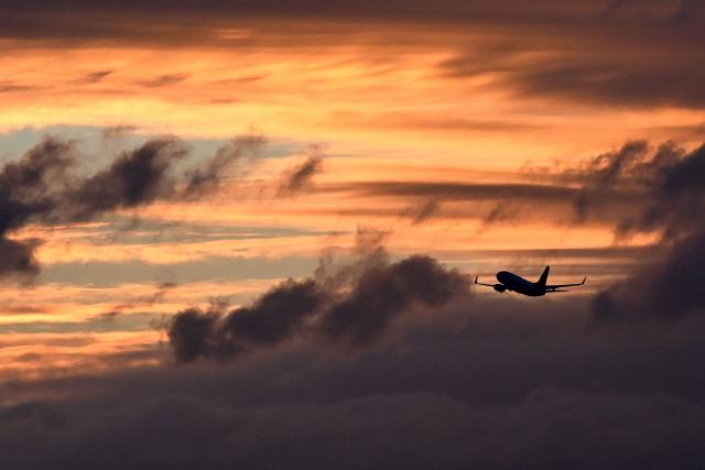 A photo taken on May 7, 2026 shows a Qantas Boeing 737 departing Melbourne's Tullamarine Airport. (Photo by William WEST / AFP)