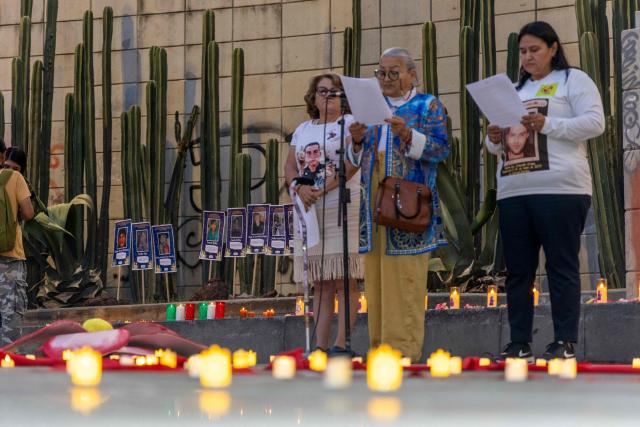 Mexican search collectives for missing persons hold a vigil at the Monument to the Mother in Mexico City on May 9, 2026, a day before the national march by the Mothers of the Disappeared on Mother's Day. (Photo by GERARDO MAGALLON / AFP)