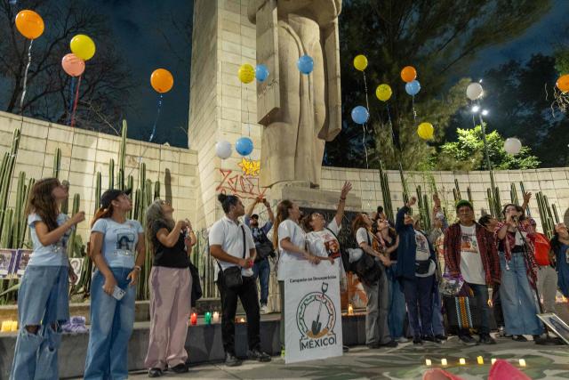 Mexican search collectives for missing persons hold a vigil at the Monument to the Mother in Mexico City on May 9, 2026, a day before the national march by the Mothers of the Disappeared on Mother's Day. (Photo by GERARDO MAGALLON / AFP)