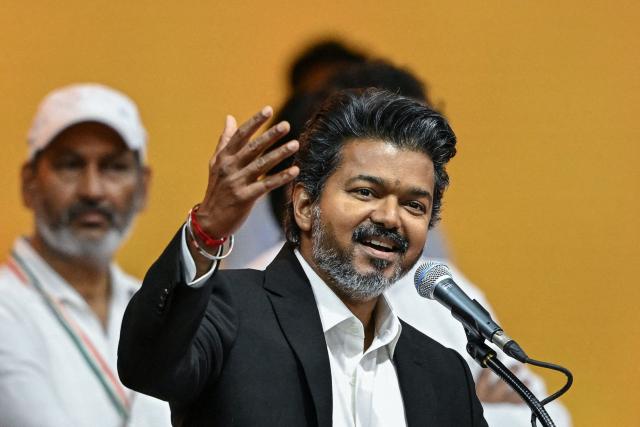 Newly elected chief minister of India's Tamil Nadu state, C. Joseph Vijay speaks after taking the oath during his swearing-in ceremony in Chennai on May 10, 2026. (Photo by R.Satish BABU / AFP)