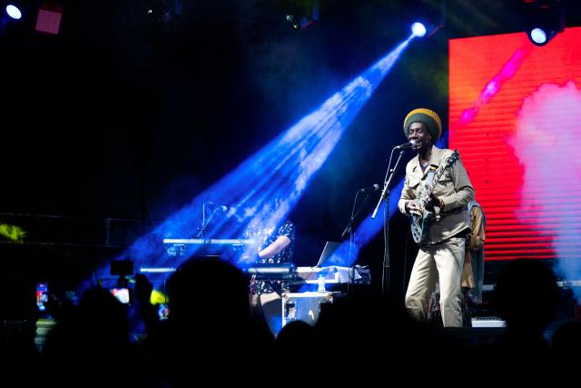 Senegalese reggae artist Meta Dia performs with his band, Meta and the Cornerstones, on the esplanade of the Museum of Black Civilizations during the Stereo Africa Festival in Dakar, on May 10, 2026. Rising reggae star Meta Dia headlined this year's Stereo Africa Festival in Dakar celebrating contemporary African music and the sounds of the diaspora. The international reggae group blends Afro, soul and hip-hop influences atop a roots reggae foundation, and is acclaimed for its overall contributions to modern reggae. (Photo by SEYLLOU / AFP)