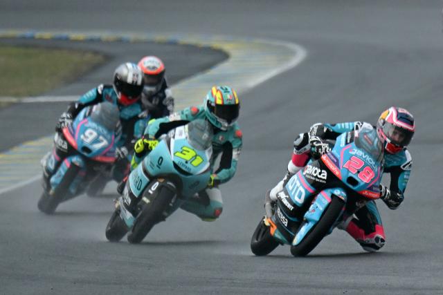 CF Moto Valresa Aspar Team's Spanish rider Maximo Quiles (R) leads Leopard Racing's Spanish rider Adrian Fernandez (C) and CF Moto Valresa Aspar Team's Argentinian rider Marco Morelli (L) during the Moto3 race as part of the Moto GP Grand Prix of France weekend at Le Mans, northwestern France, on May 10, 2026. (Photo by Loic VENANCE / AFP)