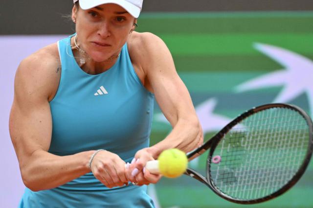 Ukraine's Elina Svitolina hits a return to USA's Hailey Baptiste during the WTA Rome Open tennis tournament at Foro Italico in Rome on May 10, 2026. (Photo by Alberto PIZZOLI / AFP)