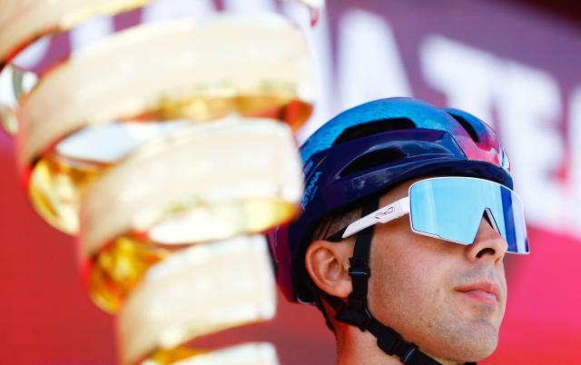 XDS Astana Team Uruguayan rider Guillermo Silva wearing the overall leader's pink jersey (Maglia Rosa) looks on during the presentation of the teams prior the 3nd stage of the Giro d'Italia 2026 - Tour of Italy cycling race between Plovdiv and Sofia, Bulgaria, on May 10, 2026. (Photo by Luca Bettini / AFP)