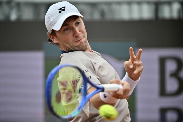 Norway's Casper Ruud hits a return to Czech Republic's Jiri Lehecka during the ATP Rome Open tennis tournament at Foro Italico in Rome on May 10, 2026. (Photo by Filippo MONTEFORTE / AFP)